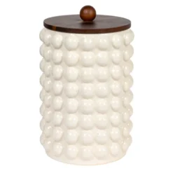 Storied Home Round Stoneware Canister With Raised Dots And Acacia Wood Lid, White And Natural 18 Storied Home Round Stoneware Canister With Raised Dots And Acacia Wood Lid, White And Natural -Interio Store GUEST 17fe89f1 45d9 4f17 9261 6f12b558b50c