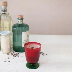 Storied Home 8 Oz. Stemmed Fluted Drinking Glass, Green And Red -Interio Store GUEST c3c04d39 213a 4e86 967f eb75874c3d1b