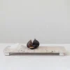 Storied Home Scandinavian Travertine Footed Charcuterie Board, Beige 1 Storied Home Scandinavian Travertine Footed Charcuterie Board, Beige -Interio Store GUEST caef8633 0973 472a 9227 4757ed71bb1f
