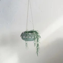 Storied Home Hanging Handwoven Rattan Planter With Shells And Jute Hanger, Aqua -Interio Store GUEST cb2c47a6 83c0 4011 a78f 8c22d7e92999