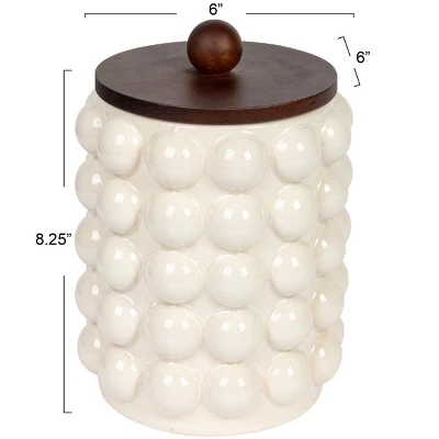 Storied Home Round Stoneware Canister With Raised Dots And Acacia Wood Lid, White And Natural 3 Storied Home Round Stoneware Canister With Raised Dots And Acacia Wood Lid, White And Natural
